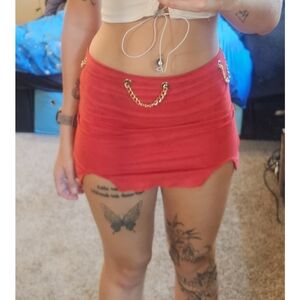 Chic Red Mini Skirt with Gold Chain Accents